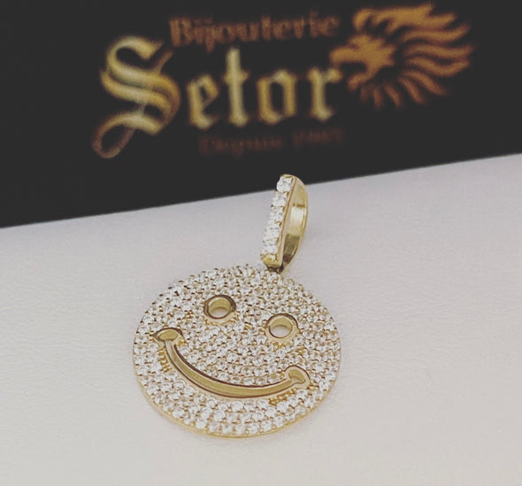 Pendentif visage souriant